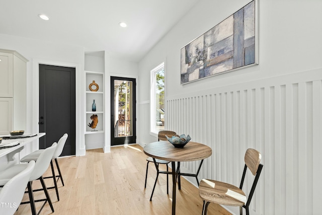 dining area with recessed lighting and light wood finished floors