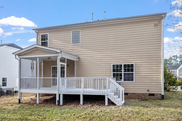 back of house featuring crawl space, a lawn, a ceiling fan, and a wooden deck