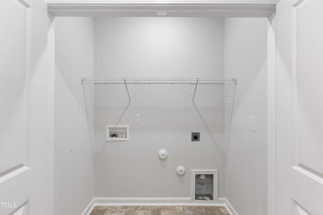 clothes washing area featuring baseboards, hookup for a washing machine, electric dryer hookup, and hookup for a gas dryer