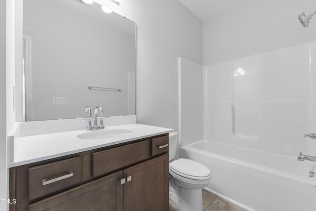 full bath featuring shower / bathing tub combination, vanity, and toilet