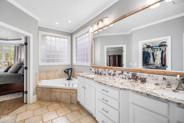 bathroom featuring a sink, ornamental molding, and double vanity