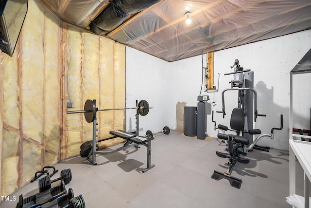 exercise room featuring tile patterned floors