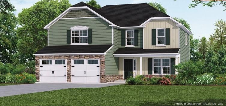 view of front of house with driveway, an attached garage, a front lawn, and board and batten siding