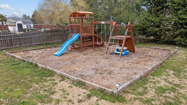 view of play area featuring fence