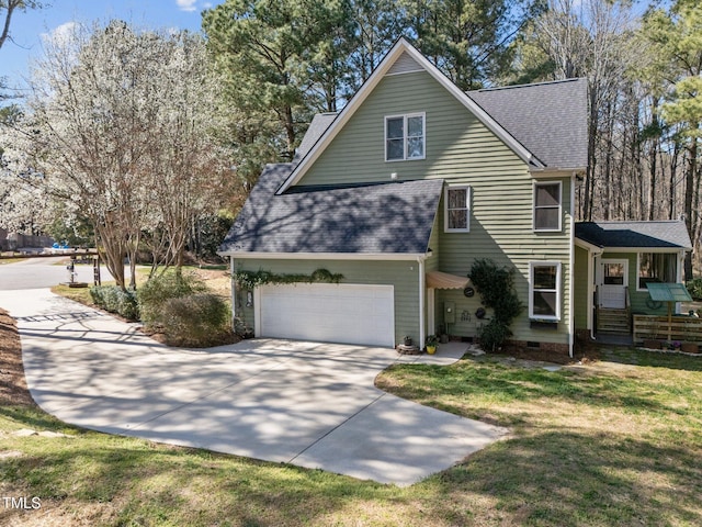 view of front of property featuring a shingled roof, a front yard, a garage, crawl space, and driveway