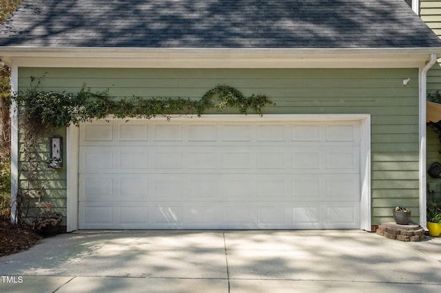 garage featuring driveway