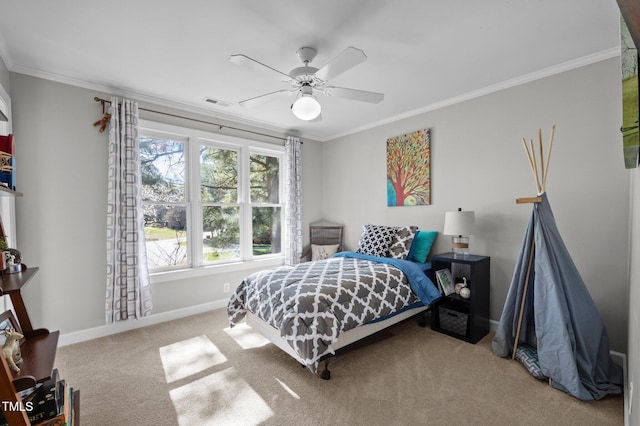 carpeted bedroom with ceiling fan, visible vents, baseboards, and ornamental molding