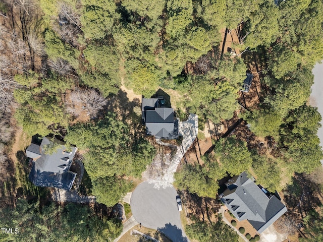 bird's eye view featuring a forest view