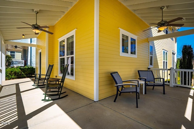 view of patio featuring ceiling fan