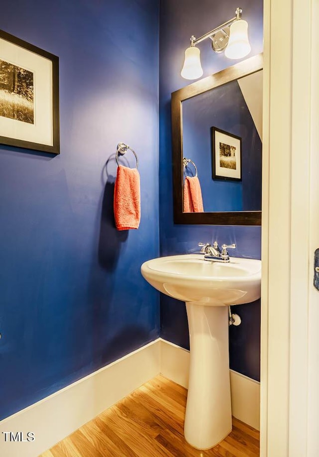 bathroom with wood finished floors