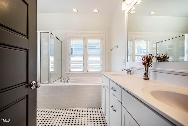 full bath with a garden tub, double vanity, recessed lighting, a sink, and a shower stall