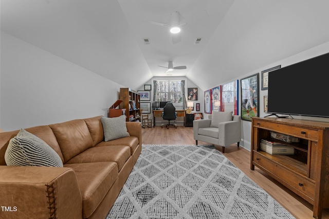 112 Rawhide Dr, Louisburg, NC 27549 - living room featuring vaulted ceiling, visible vents, light wood-style floors, and a ceiling fan