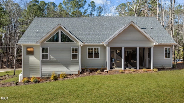 112 Rawhide Dr, Louisburg, NC 27549 - back of property featuring a lawn, roof with shingles, a sunroom, and crawl space