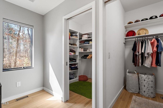 closet featuring visible vents