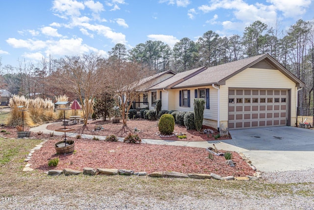 ranch-style house with an attached garage, driveway, and a shingled roof