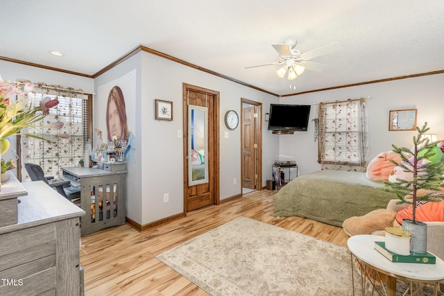 bedroom featuring baseboards, wood finished floors, a ceiling fan, and ornamental molding