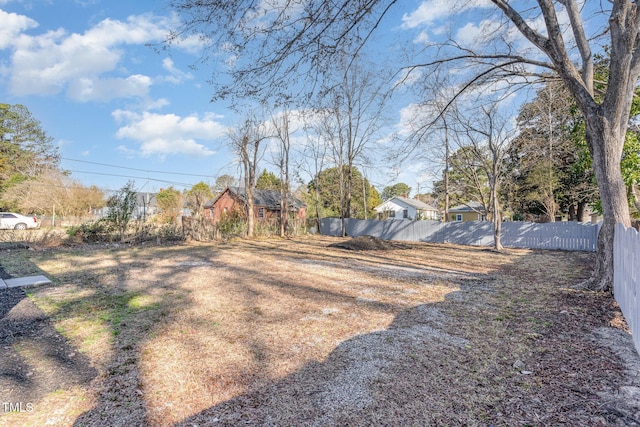 view of yard featuring fence