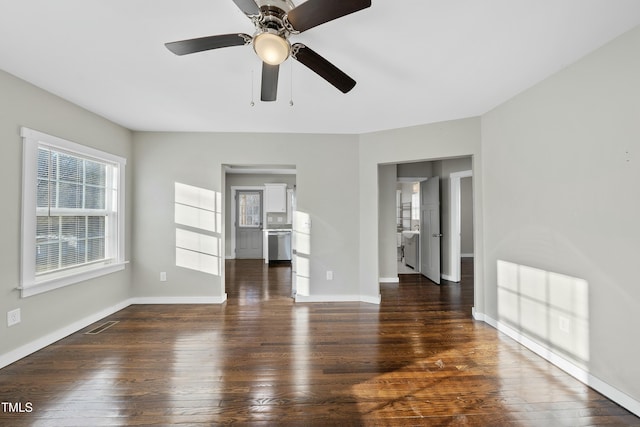 interior space featuring wood finished floors and baseboards