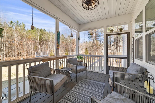 sunroom with wood ceiling