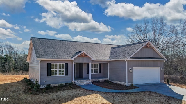 single story home featuring an attached garage, covered porch, driveway, and roof with shingles