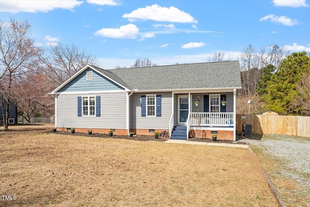 single story home featuring crawl space, covered porch, fence, a front lawn, and central AC