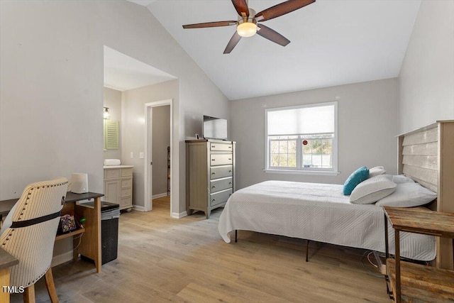 bedroom with light wood finished floors, baseboards, vaulted ceiling, and a ceiling fan