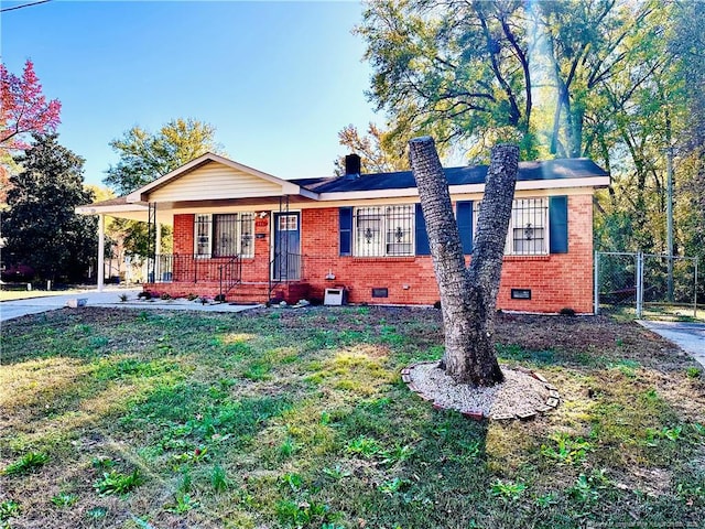 ranch-style house featuring a porch, brick siding, fence, crawl space, and a front yard