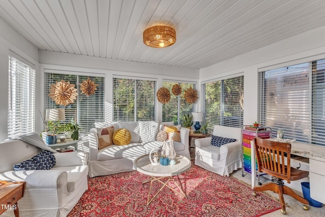 sunroom featuring wooden ceiling