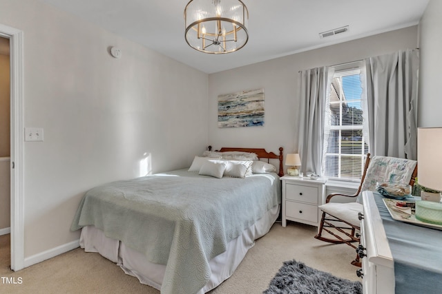 bedroom featuring visible vents, a notable chandelier, light carpet, and baseboards