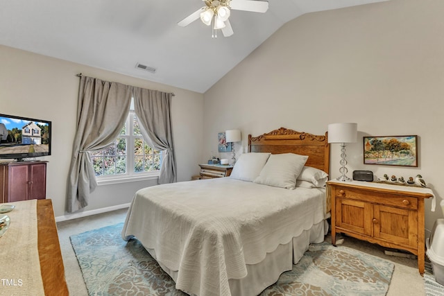 bedroom featuring light colored carpet, visible vents, a ceiling fan, vaulted ceiling, and baseboards