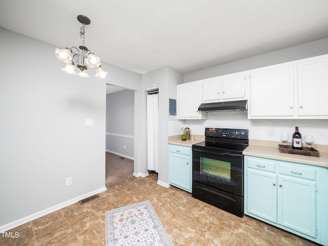 kitchen with light countertops, visible vents, black range with electric stovetop, blue cabinets, and under cabinet range hood