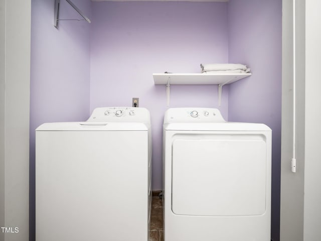 laundry area with laundry area and washer and dryer