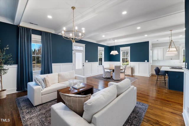 living room with recessed lighting, dark wood-style flooring, visible vents, wainscoting, and beamed ceiling