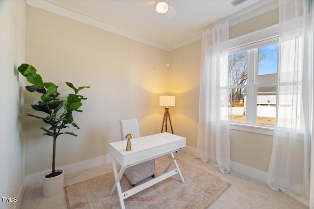 office area featuring ornamental molding, plenty of natural light, baseboards, and ceiling fan