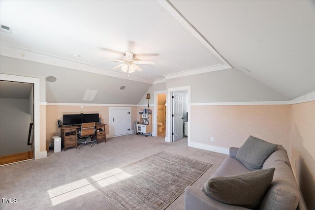 interior space featuring lofted ceiling and a ceiling fan