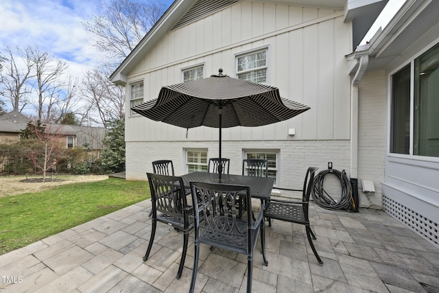 view of patio featuring outdoor dining space