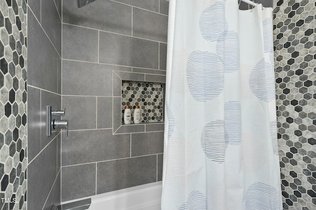 bathroom featuring shower / tub combo with curtain