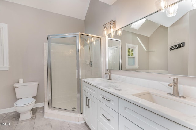 bathroom with toilet, a stall shower, vaulted ceiling, and a sink