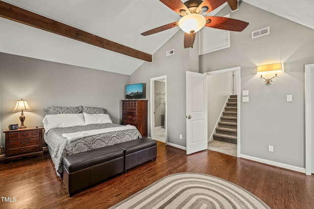 bedroom with baseboards, beam ceiling, visible vents, and wood finished floors