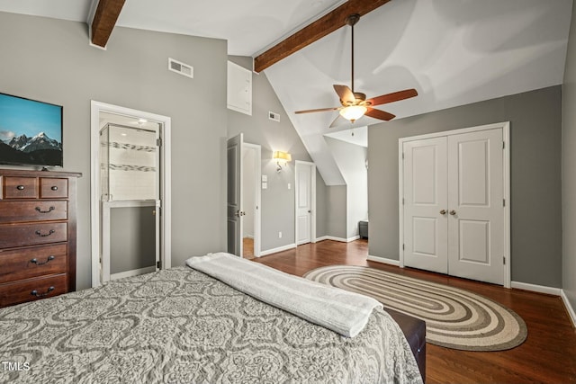 bedroom featuring a closet, beam ceiling, visible vents, and wood finished floors