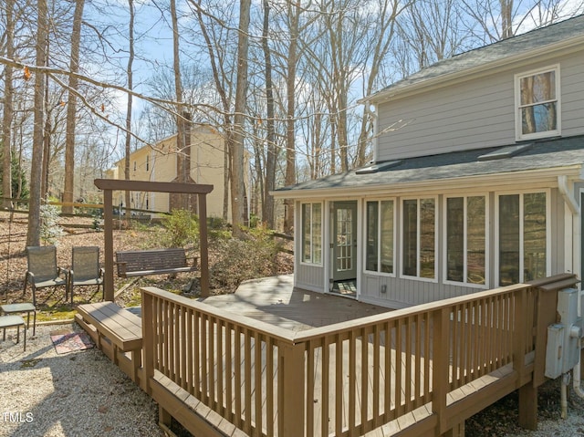 deck with a sunroom