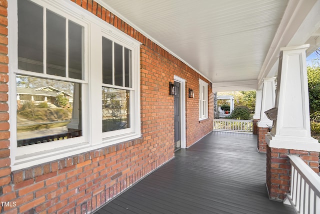 wooden terrace with covered porch