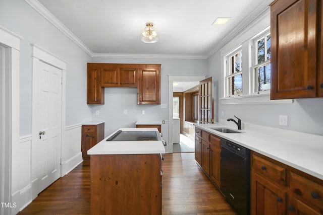 kitchen with a center island, dark wood-style flooring, ornamental molding, a sink, and dishwasher