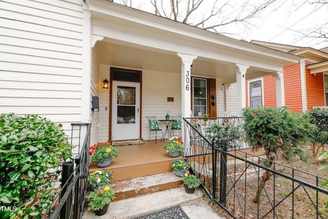 entrance to property with a porch