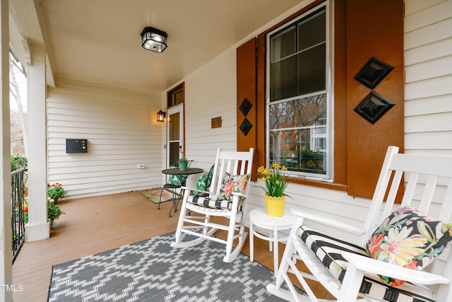 deck featuring covered porch