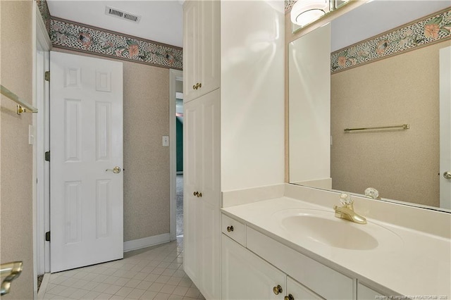 bathroom with vanity, tile patterned flooring, and visible vents