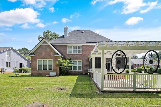 rear view of property with brick siding, a yard, a chimney, roof with shingles, and crawl space