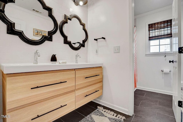 bathroom with visible vents, ornamental molding, tasteful backsplash, baseboards, and vanity