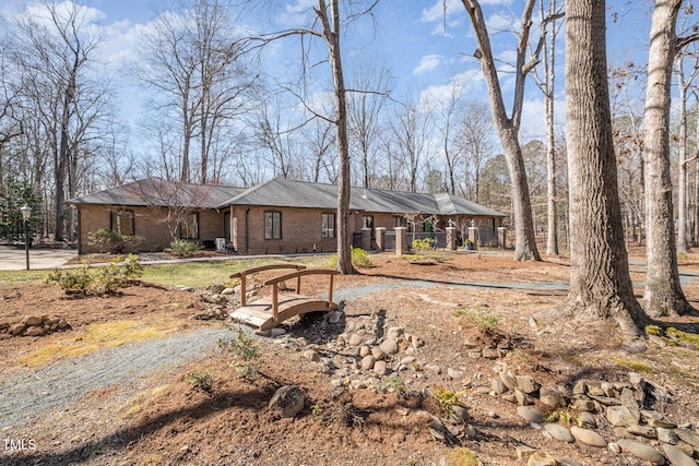 view of front of home featuring brick siding