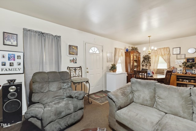 living area featuring a chandelier